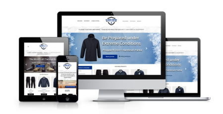 A website for outdoor gear and classic custom uniforms is displayed on a desktop, laptop, tablet, and smartphone, showing a responsive design with blue banners and images of jackets and clothing.