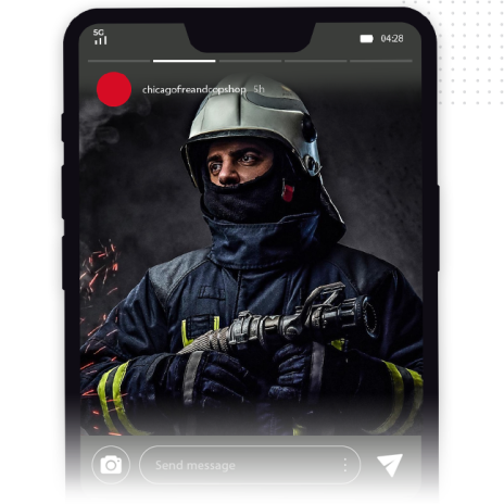 Design-Captivating-Stories-feat-img-v2 A firefighter in full gear, including helmet and gloves, holds a fire hose nozzle. Sparks fly in the background. The image appears on a smartphone as a social media story, showcasing bold social media graphics for impactful branding.