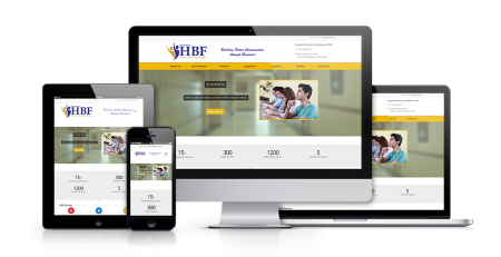 A tablet, smartphone, desktop monitor, and laptop display the Hispanic Business Foundation's educational website with a yellow and white theme, featuring images of students and navigation menus. The devices are placed on a white surface.