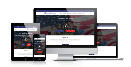 A responsive website, The Hero Resource Center, is shown on desktop, laptop, tablet, and smartphone screens—all displaying the homepage with an American flag background, people in uniform, navigation menus, and an About Us section.