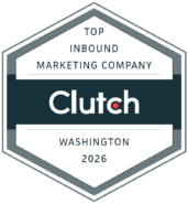 Hexagonal badge with the text: Top Inbound Marketing Company Clutch Washington 2026 in dark and light gray tones, showcasing the Clutch logo in the center—a mark of recognition and awards.